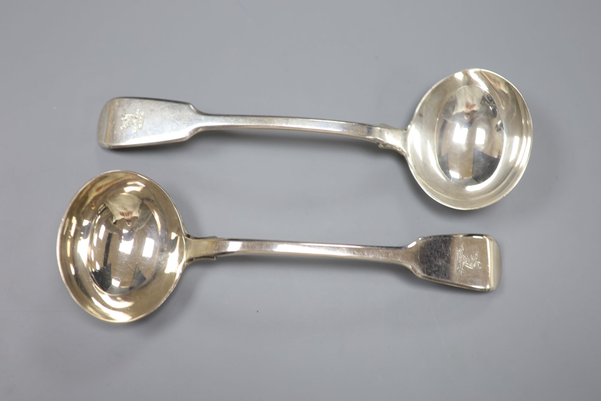 A pair of William IV silver fiddle pattern sauce ladles, Mary Chawner, London, 1834, 4oz.